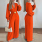 Elegante Jumpsuit mit V-Ausschnitt, weitem Bein und Gürtel